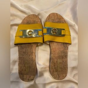 Michael Kors yellow slides